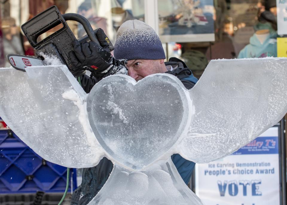 D. Sean Skelly of Attleboro, Mass., demonstrates his ice sculpting skills during the 2019 Newport Winter Festival at Long Wharf Mall.