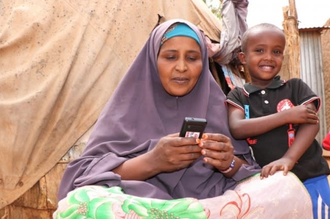 Ayan Mohamed Said is a 37-years-old mother of three living in Togdher Region (Somalia). Drought-affected families like Ayan’s, who has lost all their livestock during the drought, will take quite some time to recover and get back on their feet again, but the cash assistance through mobile phones has been a lifeline for them. It addresses their basic needs with dignity and flexibility and also adds value to local trade in areas where markets were functioning, even during the drought. Photo: Abdulkadir/NRC