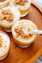 <p>Your kids will be obsessed with this pumpkin treat. It's made by layering pumpkin mousse with cheesecake mousse and topping it off with a pecan and graham cracker crumble.</p><p><strong>Get the recipe at <a href="https://cookieandkate.com/easy-pumpkin-cheesecake-cups-recipe/" rel="nofollow noopener" target="_blank" data-ylk="slk:Cookie + Kate;elm:context_link;itc:0;sec:content-canvas" class="link ">Cookie + Kate</a>.</strong> </p>