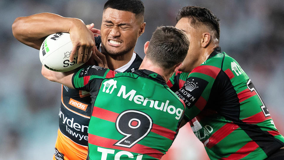 Stefano Utoikamanu, pictured here in action for the Wests Tigers.