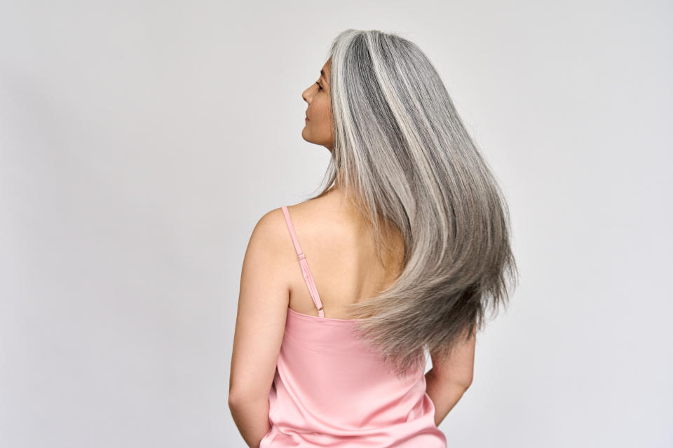 Brighten gray hair that's gone brassy with the violet pigments in this conditioner. (Photo: Getty Images)