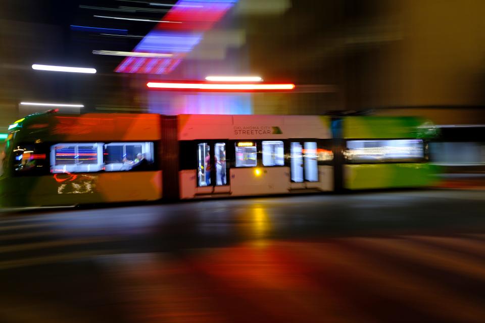 An OKC Streetcar goes north on Hudson Avenue through the intersection of Robert S. Kerr Avenue.