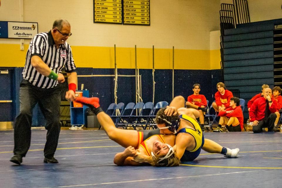 Hornet Stephen Petersen battles a Ranger in Wednesday's wrestling matches.