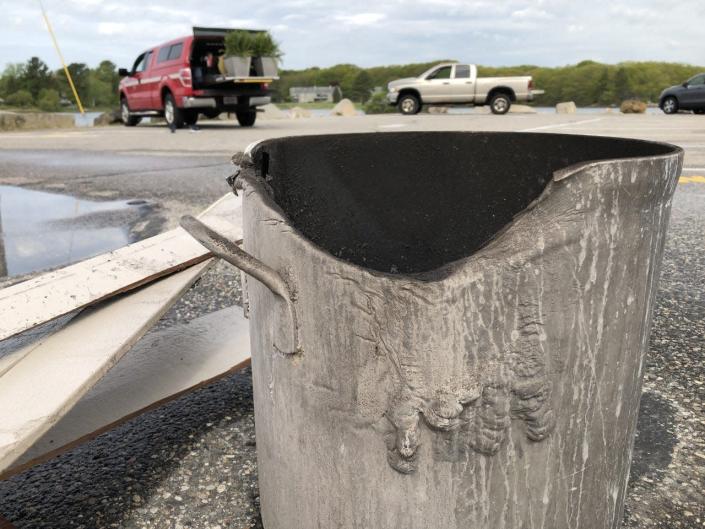 Flames melted this pot during a stove fire that caught in the kitchen of Hurricane Restaurant in Kennebunkport, Maine, on Thursday, May 26, 2022.