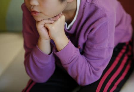 A nine-year-old girl who spent more than three months in a temporary shelter in Tokyo after being reported as a victim of abuse, is pictured at her psychotherapist's office in Tokyo, Japan March 17, 2017. Picture taken March 17, 2017. REUTERS/Toru Hanai