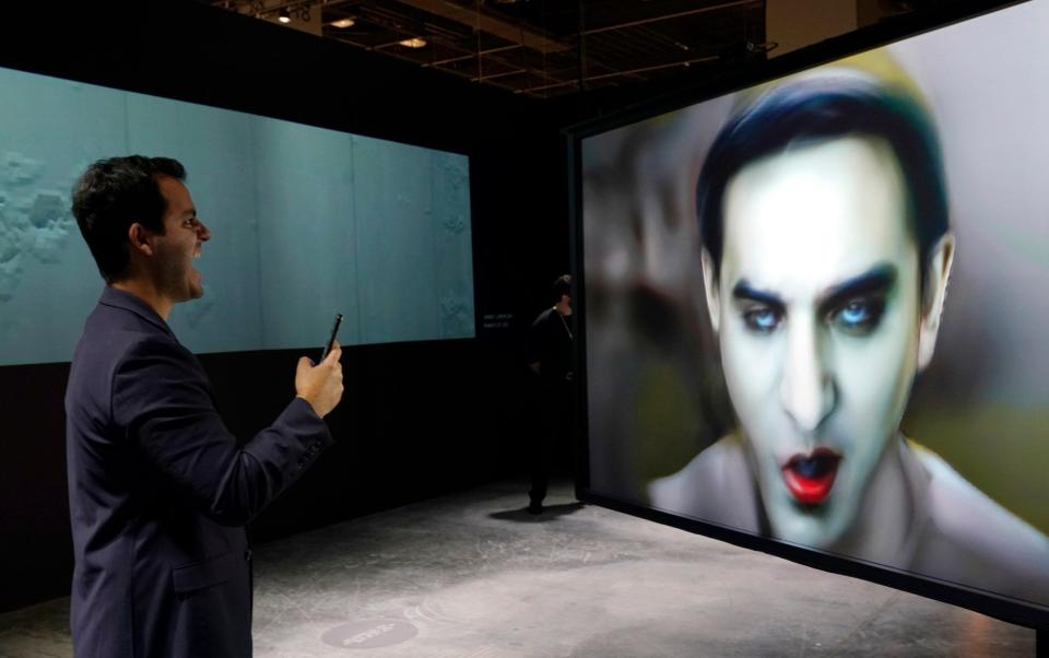 A visitor at Art Basel creates an NFT of themselves - AP