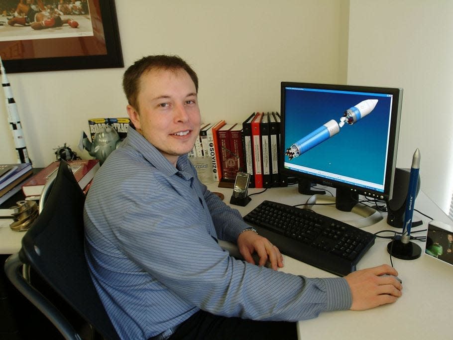 Elon Musk, multi millionaire, rocket scientist, Tesla and Space X founder and the man who inspired Tony Stark's character in Jon Favreau's "Iron Man" at his desk March 19, 2004 in El Segundo, Los Angeles, California