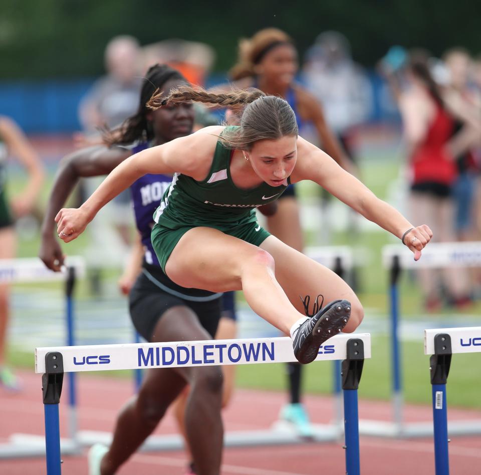 Cornwall's Caigan Leonard wins the girls division 1 100 meter hurdles final during the Section 9 Track & Field state qualifier on June 2, 2023. 