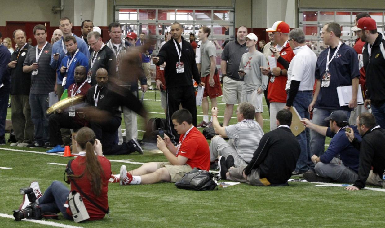 NFL scouts flocked to Alabama's Pro Day in March 2015. (AP Photo/Butch Dill)