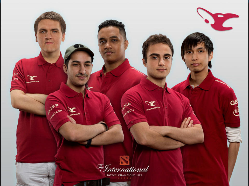 The mouseesports team standing against a white background