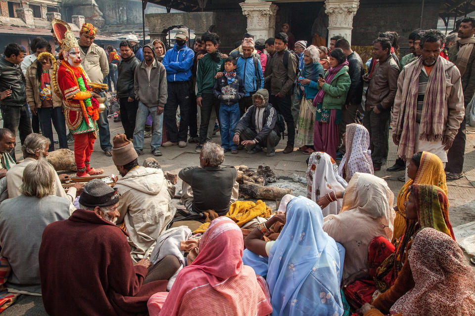 KATHMANDU, NEPAL - FEBRUARY 17:  Devotees watch a dance inside Pashupatinath temple during the celebration of the Maha Shivaratri festival on February 17, 2015 in Kathmandu, Nepal. 