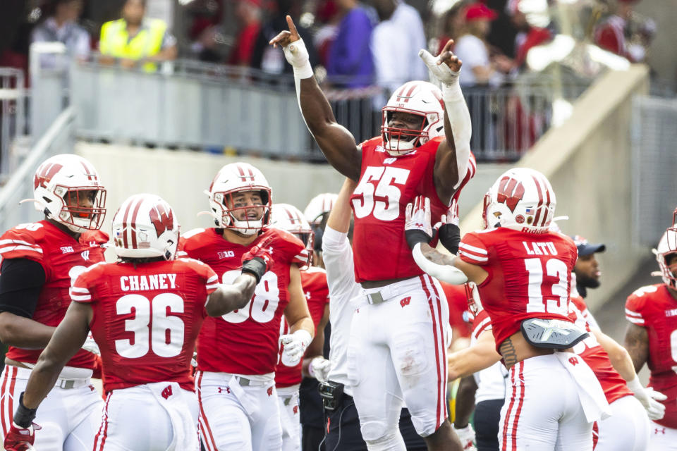 Wisconsin linebacker Maema Njongmeta (55) celebrates after recovering the fumble against the Georgia Southern during the second half of an NCAA college football game at Camp Randall Stadium in Madison, Wis., Saturday, Sept. 16, 2023. (Samantha Madar/Wisconsin State Journal via AP)