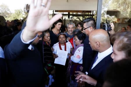 Maria de Jesus Patricio Martinez, an indigenous woman backed by Mexico's Zapatista National Liberation Army (EZLN), shows a document after she registered to run as an independent candidate in next year's presidential election at National Electoral Institute (INE) in Mexico City, Mexico, October 7, 2017. REUTERS/Violeta Schmidt