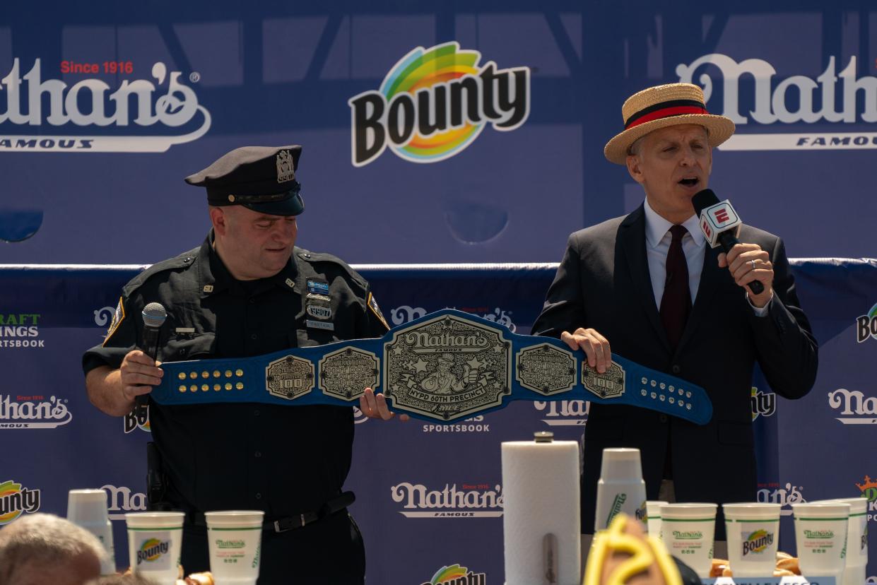 A championship belt was presented to the officers of the 60th precinct at the 2021 Nathan's Famous 4th Of July International Hot Dog Eating Contest at Coney Island on July 4, 2021, in New York City.