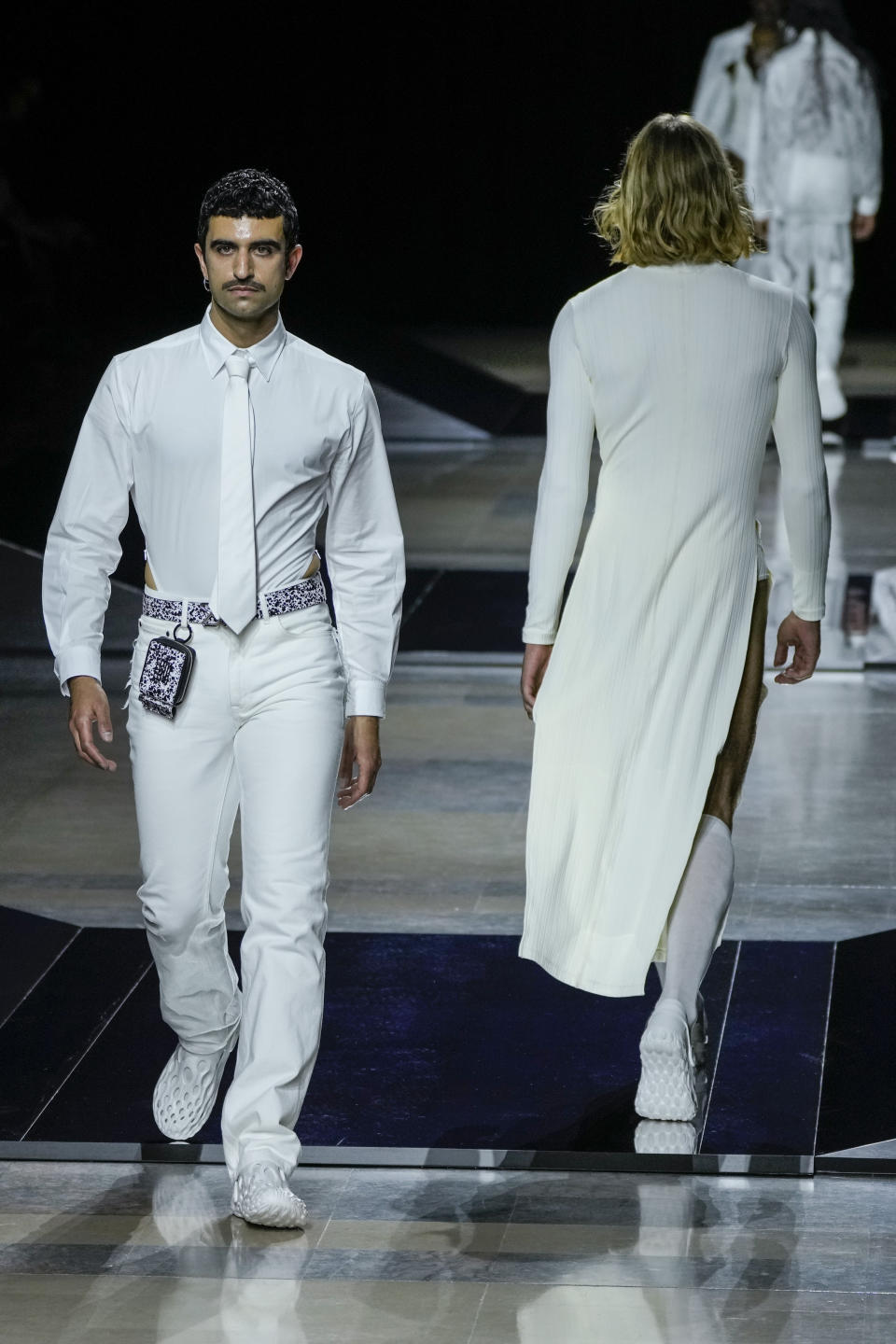 A model wears a creation for the Louis-Gabriel Nouchi fall-winter 22/23 men's collection, in Paris, Saturday, Jan. 22, 2022. (AP Photo/Francois Mori)