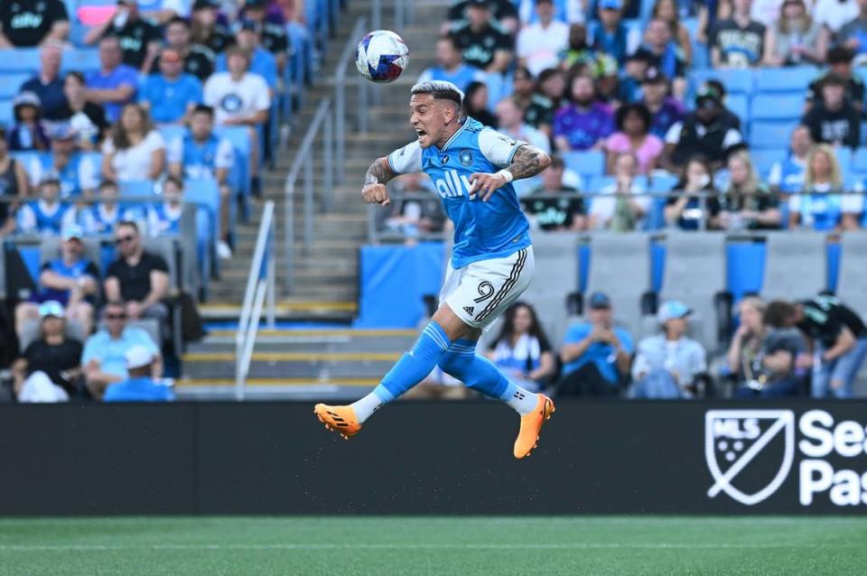 Charlotte FC attacker Enzo Copetti (9) heads the ball in the first half of Saturday’s match against New York City FC at Bank of America Stadium.