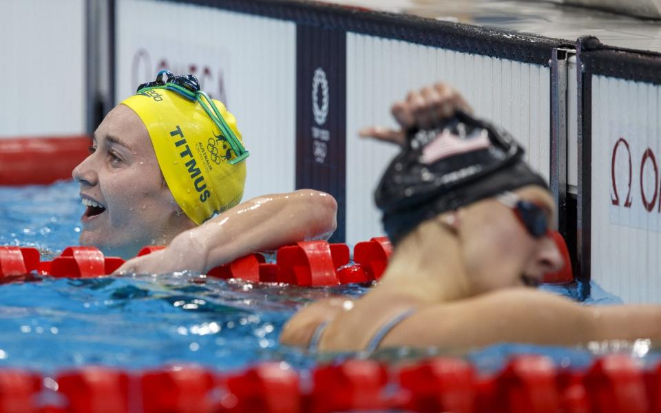 Ariarne Titmus (L) reacts having beaten Katie Ledecky (R) in a great race - SHUTTERSTOCK