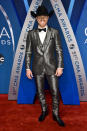 <p>The singer has everyone seeing silver, in a shining monochromatic suit. (Photo: Getty Images) </p>