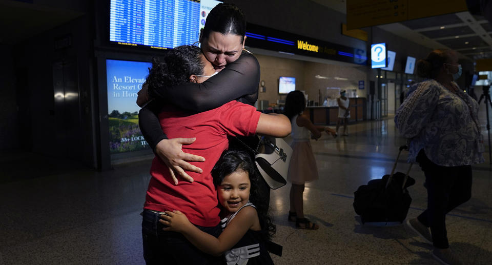 Emely and her mum were reunited in emotional scenes at a Texas airport. Source: AP