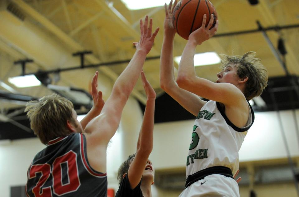 Huntington's Caiden Stewart (#5) attempts a shot during a game against Piketon on Feb. 7, 2023. Stewart ended the game with 10 points as the Huntsmen lost to the Redstreaks 75-67.