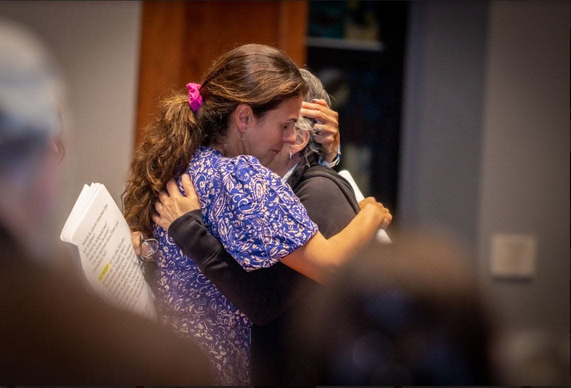 Ellie Schuster hugs her daughter Laura at the Peltz Center for Jewish Life. Schuster was born in 1948 in the Transylvania region of Romania and grew up in war-torn Europe. She eventually fled to Germany in the 1980s where she still lives today.