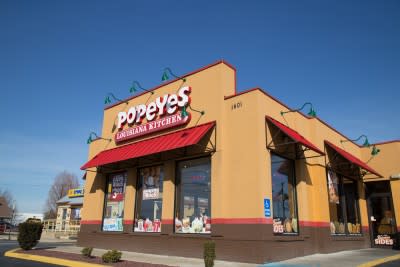 PLKI, Fast Food, Exterior of Popeyes Louisiana Kitchen Restaurant location. Popeyes Louisiana Kitchen is a chain restaurant that serves fast-food chicken at over 2500 locations