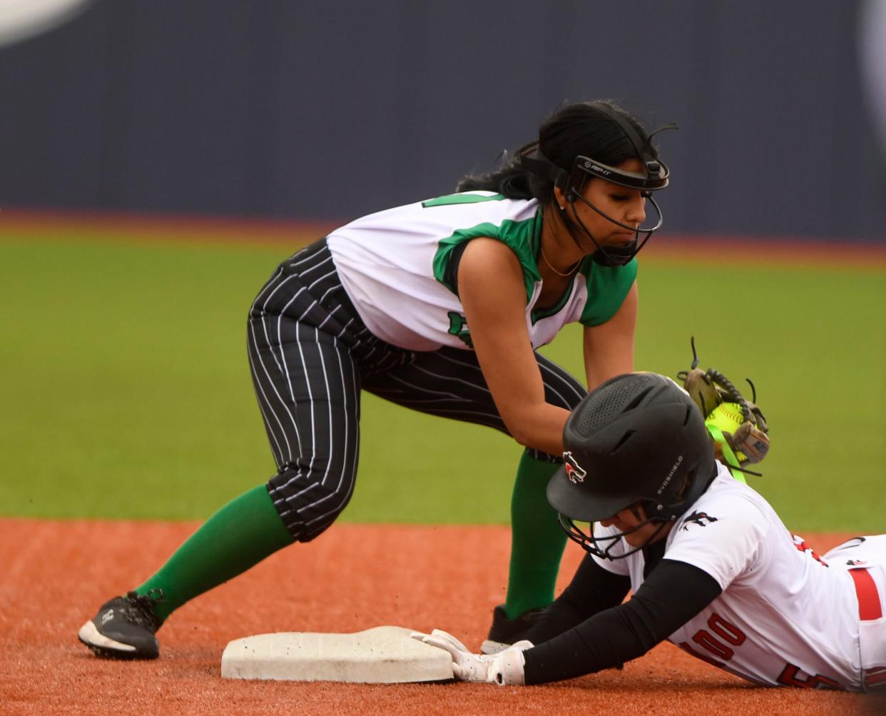 Floydada's Analise Perez attempts to get Colorado City out at second base in Game 3 of the Region I-2A quarterfinal softball series, Saturday, May 11, 2024, at Frenship Athletic Complex in Wolfforth.