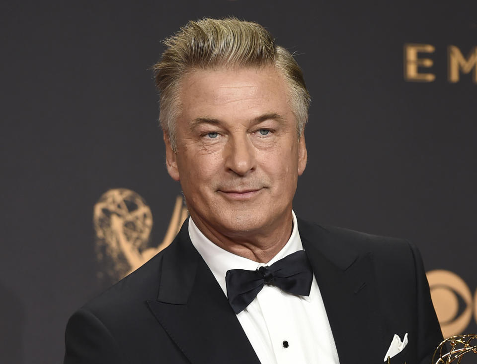 FILE - Alec Baldwin poses in the press room with the award for outstanding supporting actor in a comedy series for "Saturday Night Live" at the 69th Primetime Emmy Awards in Los Angeles on Sept. 17, 2017. The family of a cinematographer shot and killed by Alec Baldwin on the set of the film “Rust” has agreed to settle a lawsuit against Baldwin and the movie's producers, and production will resume on the project. (Photo by Jordan Strauss/Invision/AP, File)