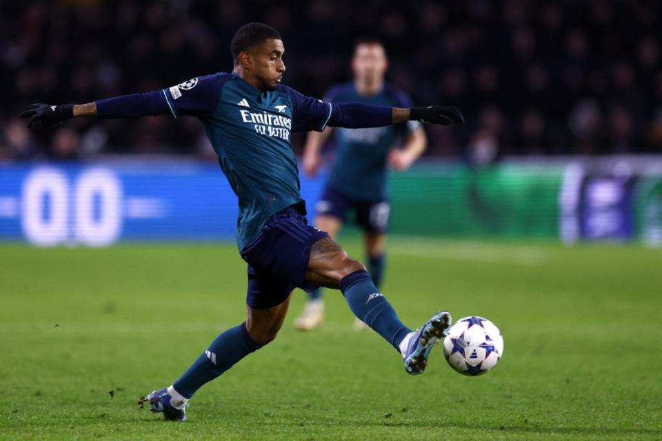 Arsenal's British forward #24 Reiss Nelson controls the ball during a UEFA Champions League group B football match between PSV Eindhoven and Arsenal FC at the Philips Stadium in Eindhoven, on December 12, 2023. (Photo by KENZO TRIBOUILLARD/AFP via Getty Images)