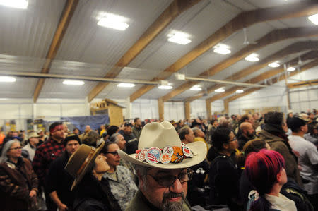 Veterans attend a Sioux tribal welcome meeting at Sitting Bull College as "water protectors" continue to demonstrate against plans to pass the Dakota Access pipeline near the Standing Rock Indian Reservation, in Fort Yates, North Dakota, U.S., December 3, 2016. REUTERS/Stephanie Keith