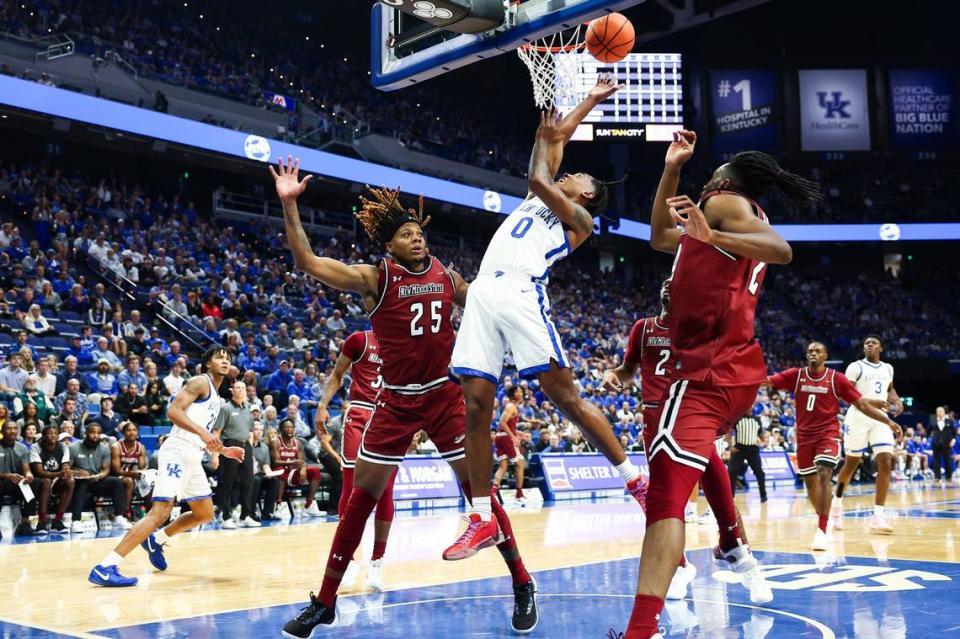 Kentucky guard Rob Dillingham (0) shoots the ball against New Mexico State forward Clarence Jackson (25) during Monday’s game at Rupp Arena.