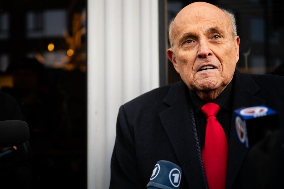 Rudy Giuliani speaks to members of the media on  21 January 2024 in Manchester, New Hampshire (Getty Images)