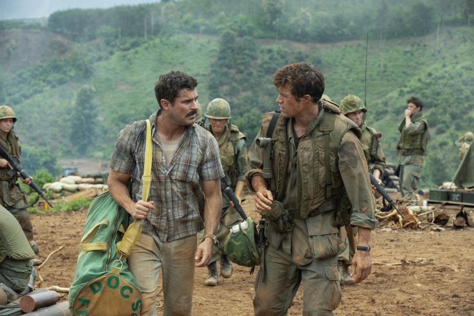 Chickie (Zac Efron, left) heads to Vietnam to deliver beer personally to his soldier buddies, including pal Rick (Jake Picking), in the war dramedy "The Greatest Beer Run Ever."