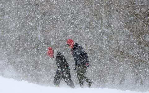 Walkers battling the snow in County Kildare, Scotland