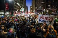 People celebrate after media announced that Democratic U.S. presidential nominee Joe Biden has won the 2020 U.S. presidential election, in Philadelphia