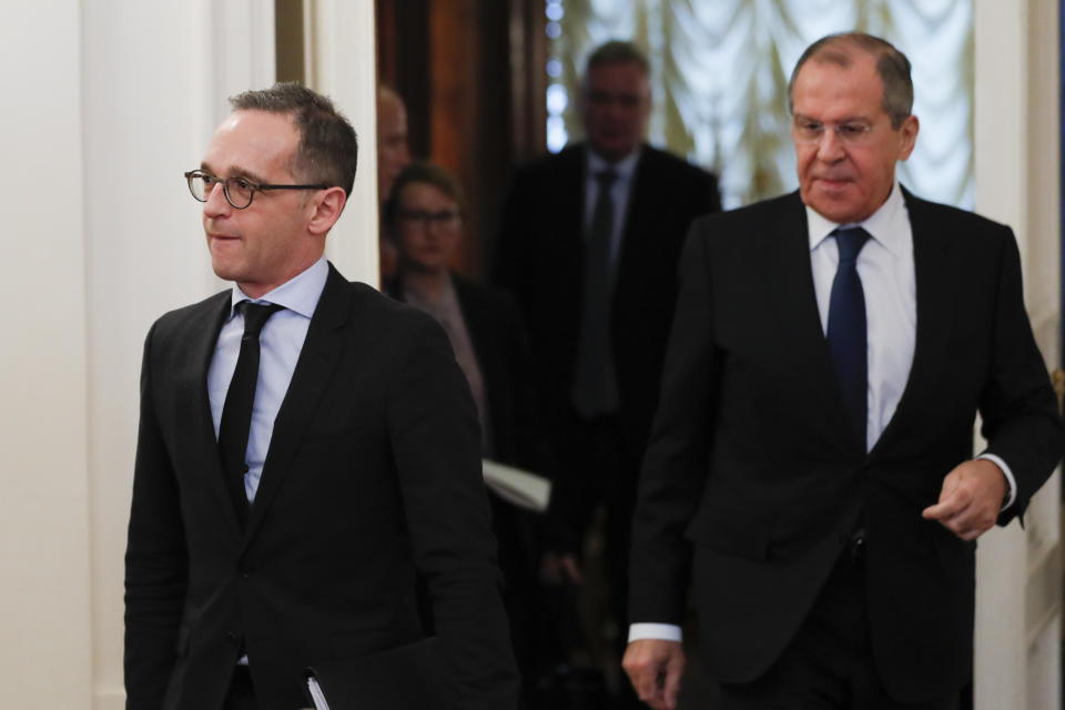 Russian Foreign Minister Sergey Lavrov, right, and Germany's Foreign Minister Heiko Maas enter a hall for their talks in Moscow, Russia, Friday, Jan. 18, 2019. Germany's foreign minister has urged Russia to save a key arms treaty with the U.S. to prevent a new arms race. (AP Photo)