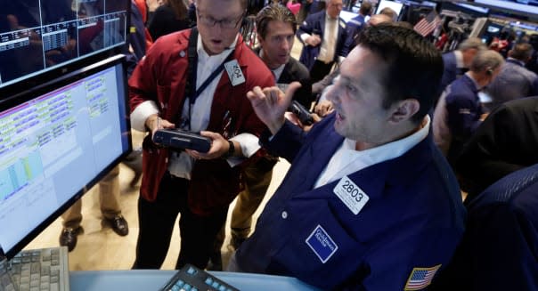 new york stock exchange traders wall street investing stocks earnings