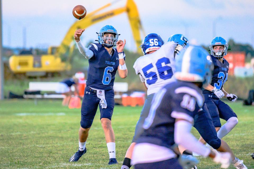 Tolton's Jake Ryan (6) throws a pass to Cameron Lee (11) during the Trailblazers' 34-29 loss to Putnam County on Sept. 2.