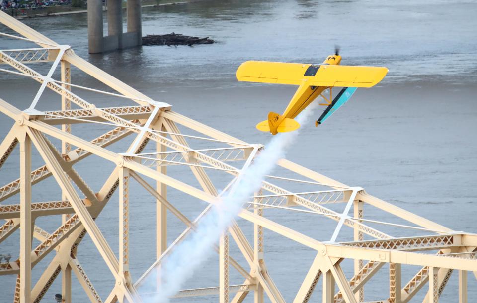 The Jeff Gordon Carbon Cub Float Plane flies overhead during the Thunder Over Louisville airshow on Saturday, April 20, 2024.