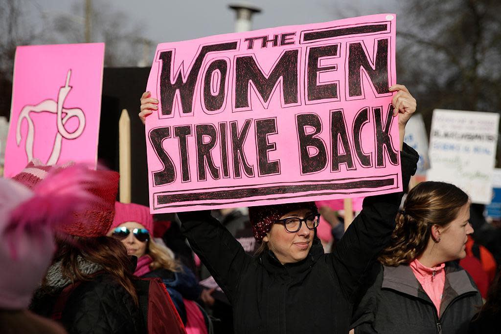 People gather at Judkins Park during the Women's March in Seattle, Washington on January 21, 2017. Led by women in pink "pussyhats," hundreds of thousands of people packed the streets of Washington and other cities Saturday in a massive outpouring of defiant opposition to America's hardline new president, Donald Trump: JASON REDMOND/AFP/Getty Images