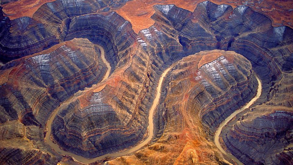 a meandering river through rocky terrain.