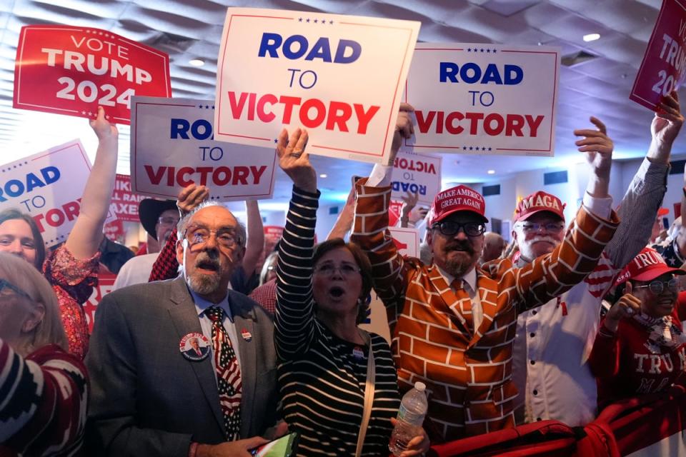 Supporters cheer as Donald Trump speaks in South Carolina on Saturday (AP)