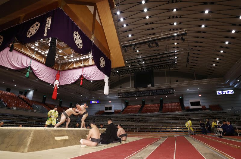 Spectator's seats are seen empty during a match of the Spring Grand Sumo Tournament which is taking behind closed doors amid the spread of the new coronavirus, in Osaka, western Japan