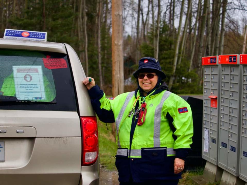 Canada Post mail carrier Jacquie Woolley says in addition to using up her gas allowance, she now pays out of her own pocket to subsidize her trips to deliver mail in the northern B.C. city of Prince George. (Nadia Mansour/CBC - image credit)