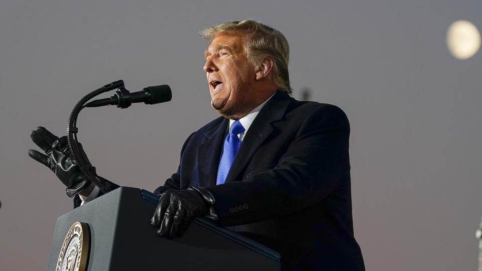 President Donald Trump speaks during a campaign rally at MotorSports Management Company, Tuesday, Oct. 27, 2020, in West Salem, Wis. (AP Photo/Evan Vucci)