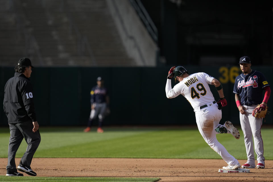 Oakland Athletics' Ryan Noda (49) runs the bases after hitting a three-run home run against the Atlanta Braves during the fifth inning of a baseball game in Oakland, Calif., Monday, May 29, 2023. (AP Photo/Godofredo A. Vásquez)