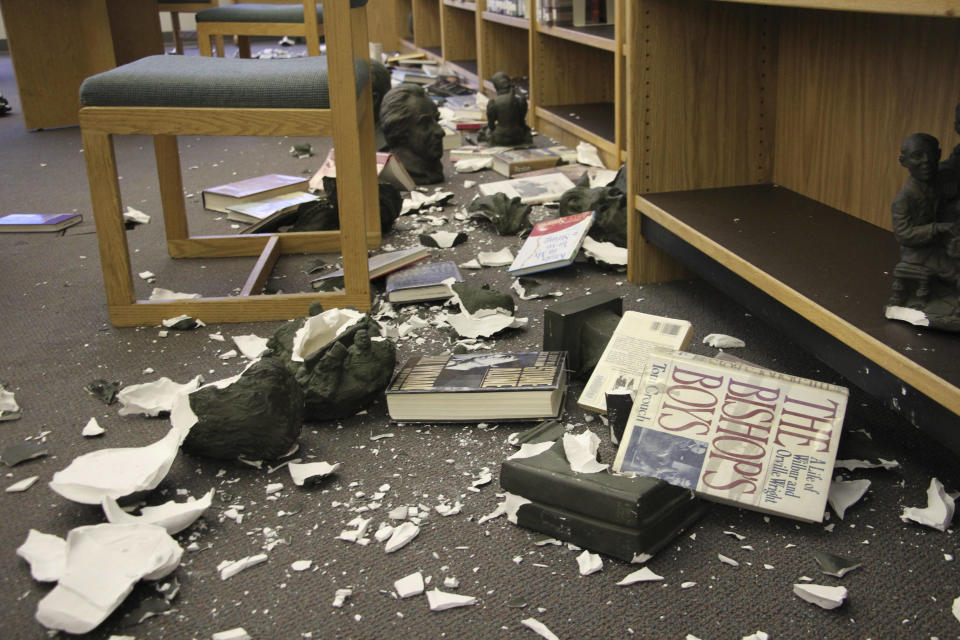 Damage is shown to the library at Chugiak High School in Chugiak, Alaska, following earthquakes Friday, Nov. 30, 2018. Acting Principal Allison Susel said ceiling tiles came down, books and other items were thrown off shelves in the library and there was water damage, but there were no injuries. (Photo: Mark Thiessen/AP)