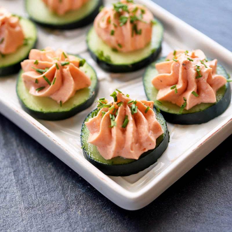 <p>Healthy Recipes</p><p>An easy 20-minute recipe for smoked salmon mousse made with cream cheese and served on cucumber slices.</p><p><strong>Get the recipe: <a href="https://healthyrecipesblogs.com/smoked-salmon-mousse/" rel="nofollow noopener" target="_blank" data-ylk="slk:Smoked Salmon Mousse;elm:context_link;itc:0;sec:content-canvas" class="link ">Smoked Salmon Mousse</a></strong></p>