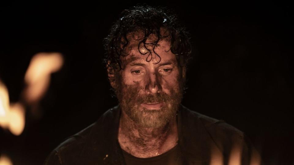 rick grimes in the walking dead season finale with a bloody face