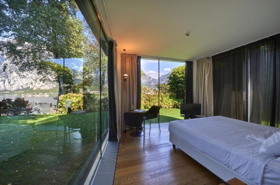 <p><a href="https://www.goodhousekeepingholidays.com/offers/italy-lake-como-malgrate-casa-sull-albero-hotel" rel="nofollow noopener" target="_blank" data-ylk="slk:Casa sull'Albero;elm:context_link;itc:0;sec:content-canvas" class="link ">Casa sull'Albero</a> is a minimalist design hotel set on a hillside in its own peaceful grounds.</p><p>This is definitely the place to stay if your dream is a stylish hotel where you can truly appreciate the magnificence of the surrounding landscapes. <br></p><p>Many of the rooms have floor-to-ceiling windows, allowing you to feel in harmony with the nature of Lake Como. </p><p>The grounds outside are equally impressive. The hotel is in the ancient town of Malgrate and is surrounded by a woodland park filled with centuries-old trees and with an open-air swimming pool.</p><p>Relax in the hotel's stunning gardens and appreciate the sounds of the birds chirping overhead while you enjoy views of the lake.<br></p><p><a class="link " href="https://www.goodhousekeepingholidays.com/offers/italy-lake-como-malgrate-casa-sull-albero-hotel" rel="nofollow noopener" target="_blank" data-ylk="slk:READ OUR REVIEW;elm:context_link;itc:0;sec:content-canvas">READ OUR REVIEW</a></p>